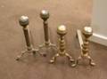 Two Pairs of Brass Belted Balltop Andirons