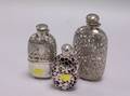 Three Sterling Silver Mounted Glass Liquor Flasks