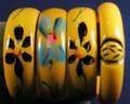 Four Painted Bakelite Butterscotch Bangles