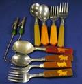Eight Bakelite Childrens Utensils