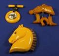 Three Bakelite Horse Brooches