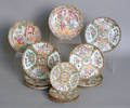 Fifteen Chinese export rose medallion plates