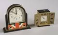 Two Small Art Deco Style Clocks
