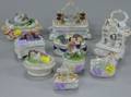 Ten Porcelain Figural Trinket Boxes