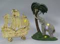 Painted Cast Iron Elephant and Coconut Tree Doorstop and a Painted Cast Iron Sailing Ship Doorstop
