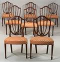 Assembled Set of Eight Federal Mahogany Carved Shieldback Dining Chairs