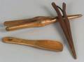 Two Shaker Wooden Glove Stretchers and a Small Scoop