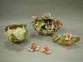 Five Porcelain Floral Encrusted Figural Groups
