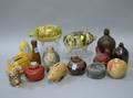Collection of Fifteen Ceramic and Wooden Figural Still Banks