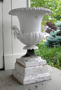 Two cast iron urns
