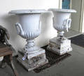 Pair of Victorian cast iron garden urns