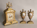 Gilt metal and painted porcelain clock garniture set