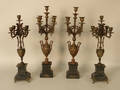 Two pair of bronzed candelabra