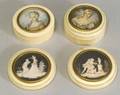 Four Miniature Mounted Ivory Articles