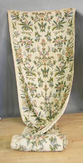 Large roll of crewelwork fabric