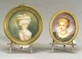 Two Portrait Miniatures with a Pair Cartier Sterling Silver Easels