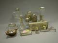 Twelve Small English Silver and Silver Mounted Glass Table Articles