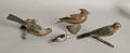 Group of four carved polychromed birds