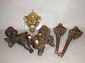 Pair of Cast Iron Figural Wall Brackets a Bronze Grotesque Mask and a Pair of Painted Plaster Cherubs