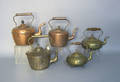 Five brass and copper tea kettles