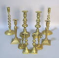 Five pair brass candlesticks