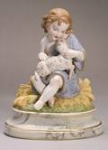 Bisque Porcelain Figure of a Child with a Lamb