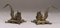 Pair of Bronze Dolphinform Candlesticks