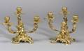 Pair of French Louis XVstyle Gilt Bronze Figural Three Light Candelabra