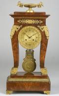 French Empire Mahogany and Ormolu Mounted Mantel Clock