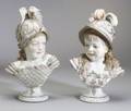 Pair of Dresden Porcelain Busts of Classically Attired Children