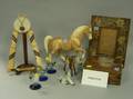 Eleven Plastic and China Horse Figures Set of Five Glass Cordials a Spinning Wheel Table Lamp a Firkin and a Native American Instrum