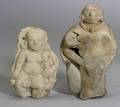 Two PreColumbian Maternity Figures and a Childs Woven Poncho