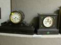 Two French Black Marble Inlaid Mantel Clocks