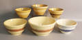Six yelloware mixing bowls