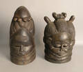 Two carved African mask helmets