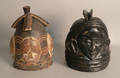 Two carved African mask helmets