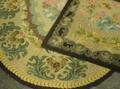 Two Floral Hooked Rugs