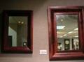 Two Mahogany Veneer Ogee Mirrors