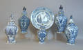 Five Delft garnitures