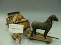 Four Hide and Cloth Horse Pull Toys with Painted Wooden Wagons and Carts