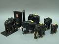 Group of Six Ebony and Ivory Elephant Figures and Bookends