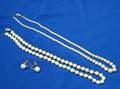 Two Strands of Pearls and a Pair of Pearl and Emerald Earrings