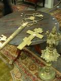 Russian Brass Crucifix an Ornamental Brass Key and an Indian Bronze Lamp