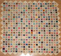 Unusual Pennsylvania appliqu quilt with floating calico squares on a pieced linen background