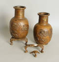 Pair of oriental bronze urns