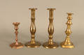 Four brass candlesticks