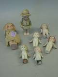 Seven Small Japanese Bisque Dolls and Figures