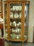 Late Victorian Carved Oak and Curved Glass China Cabinet