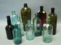 Ten Blown and Molded Colored Glass Bottles