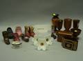 Collection of Fourteen Miniature Shoes Six Turned Wooden Vessels Three Tooled Leather Desk Items a Trinket Box a Set of Twelve Flor